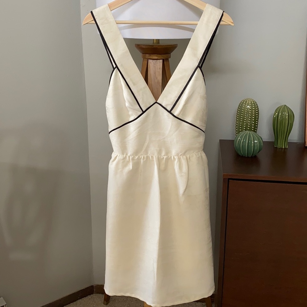 So cute, Black and white strap he dress. Never worn.